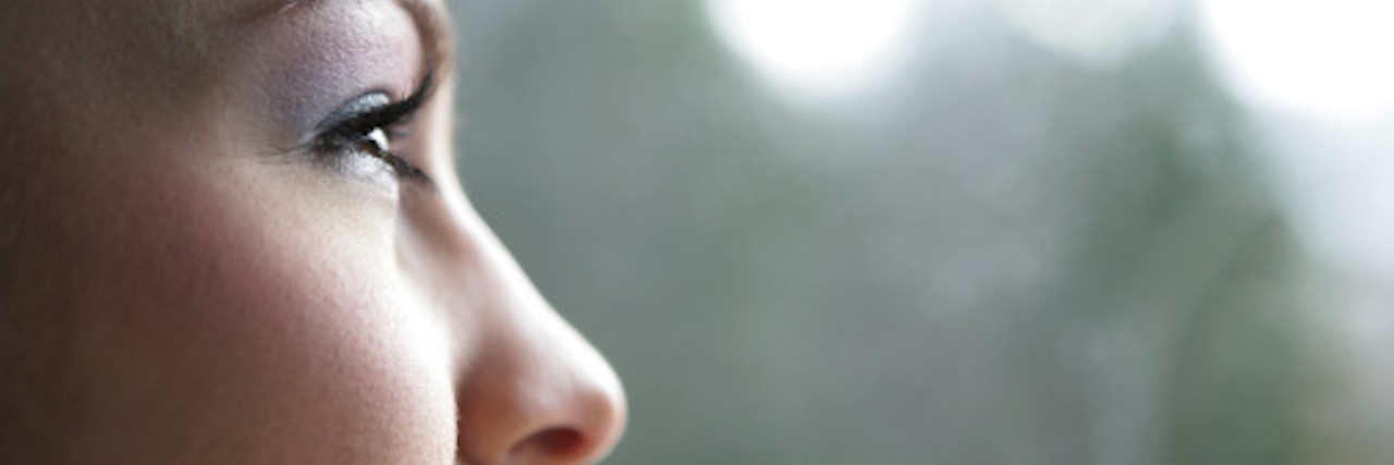 Ignorance Isn't Bliss: Accepting an Anxiety Diagnosis Woman looks out of window