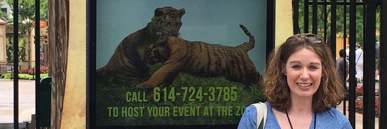 A Mother's Wish for Her Child With Williams Syndrome Jennifer and her daughter in front of a sign that sas "Williams Syndrome Foundation"