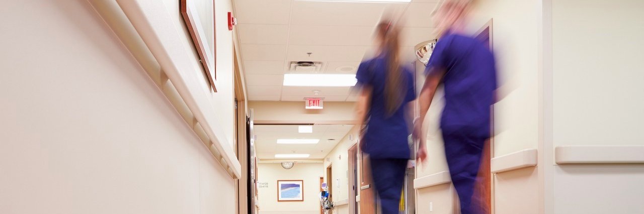 Reminding Myself I Have Power When I Feel Powerless as a Patient busy hospital corridor with medical staff