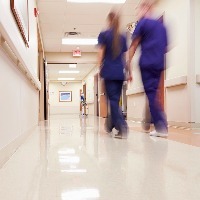 busy hospital corridor with medical staff