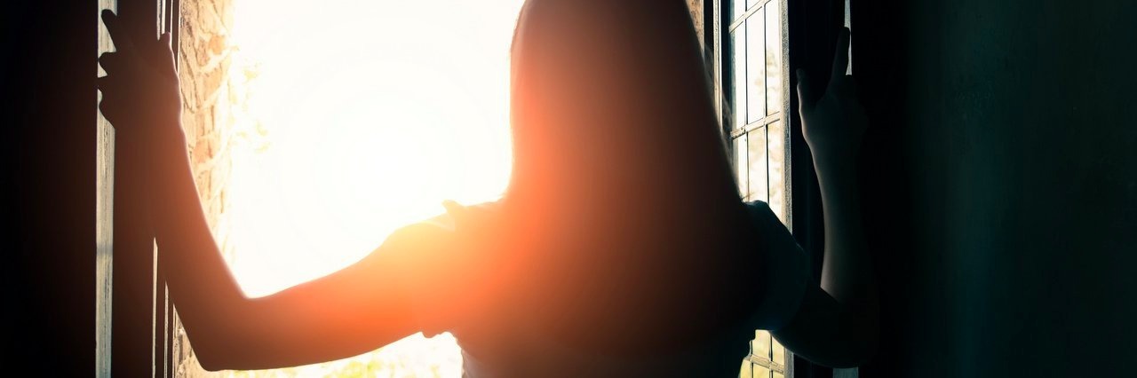 Child Loss: Mornings Are the Hardest Time for Me woman opening window