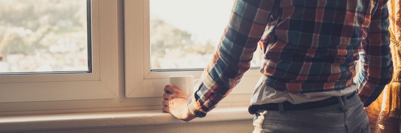 Words of Encouragement to Special Needs Moms woman looking out window