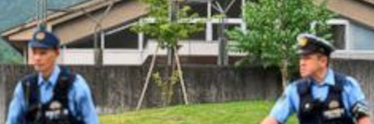 Stabbing at Facility for Disabled People in Japan Leaves 15 Dead two police officers at stabbing in japan