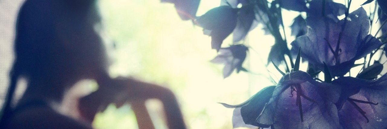 Chronic Illness: Comparing Myself to the Other Wonderful Parts of Me woman staring out the window