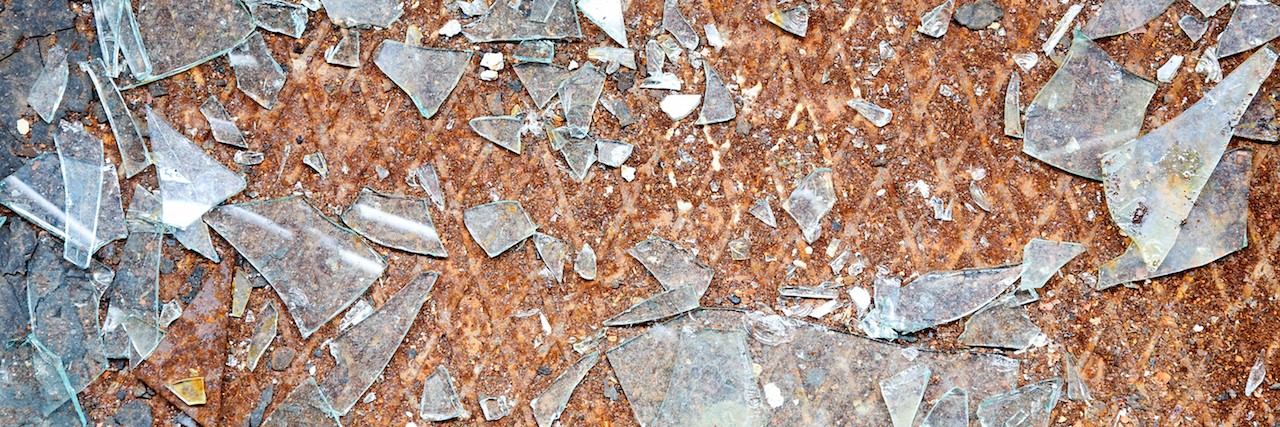 Rusty old metal floor and glass