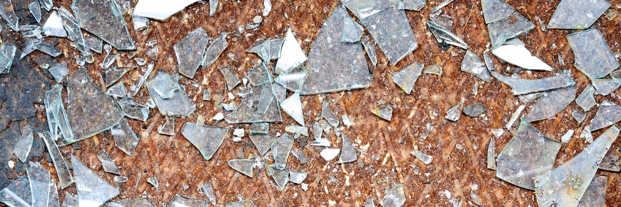 Rusty old metal floor and glass