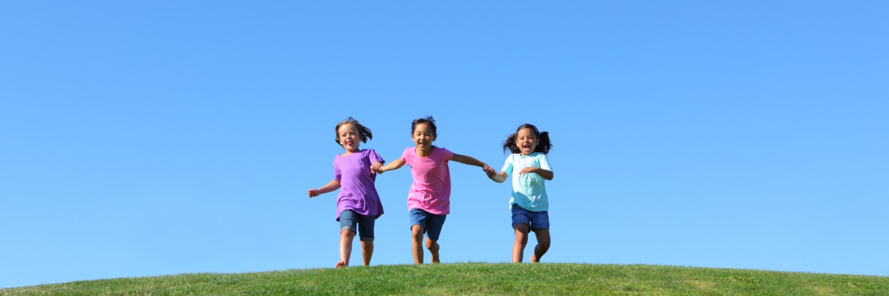 The Opposite of Anxiety Children running together holding hands