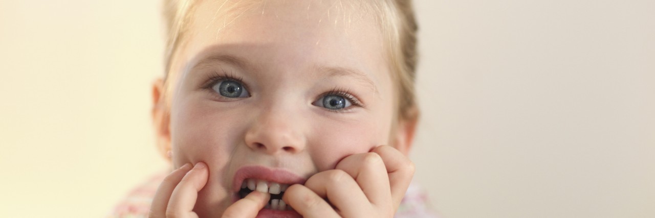 Passing Anxiety on to My Daughter and How to Help Her Portrait of young girl, close up