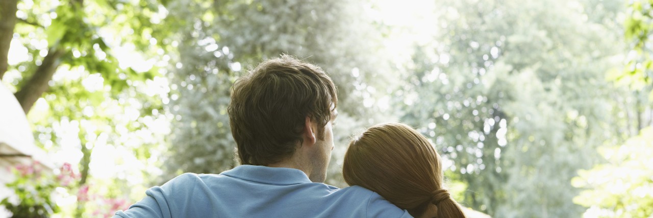 How I'll Explain My BPD to My Future Husband Couple on bench, woman resting head on man's shoulder, rear view