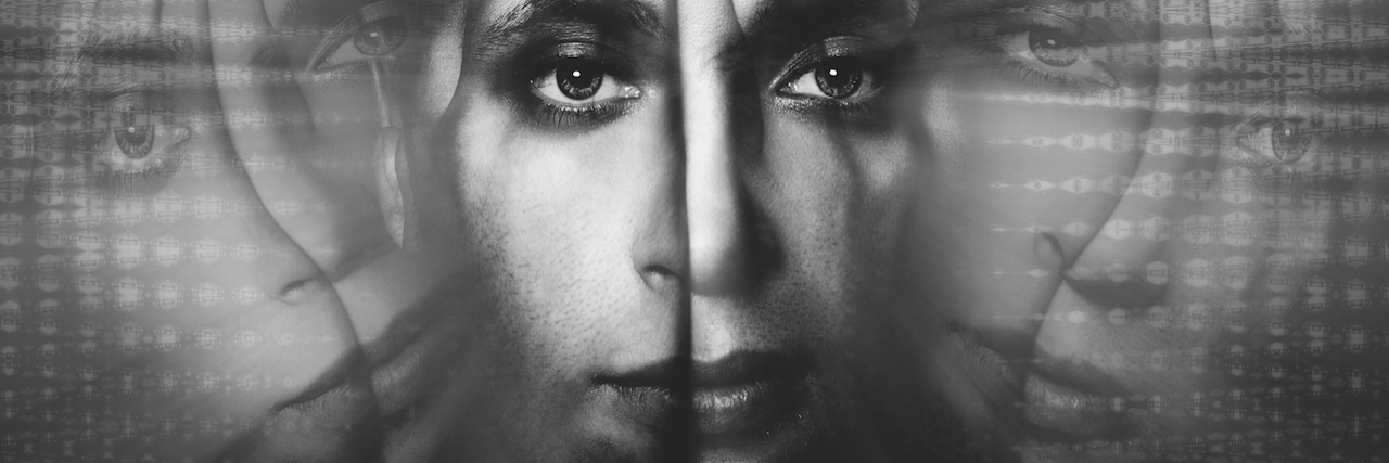 Media Portrayal of Schizophrenia Perpetuates Stigma man covering his face with his hands, with reflections of his face sticking out