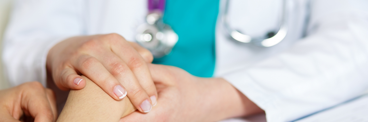 What Medical Professionals Need to Understand About Cerebral Palsy Doctor talking to a patient.