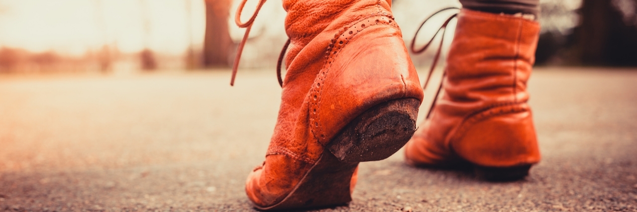 Letter to Strangers Who Laugh and Stare Because of How I Walk Closeup on a woman's feet as she is walking in the park on a sunny day