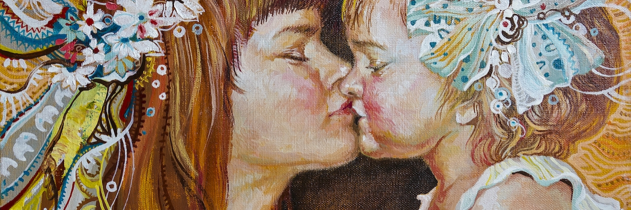 mother and daughter kissing