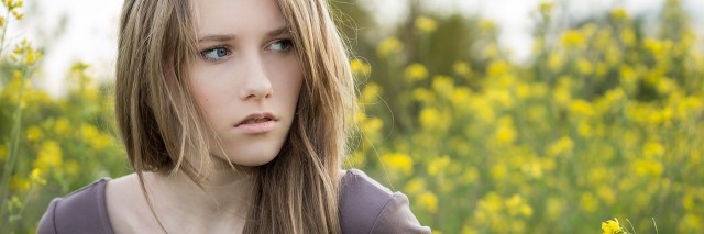 Young beautiful girl outdoor portrait, emotional look