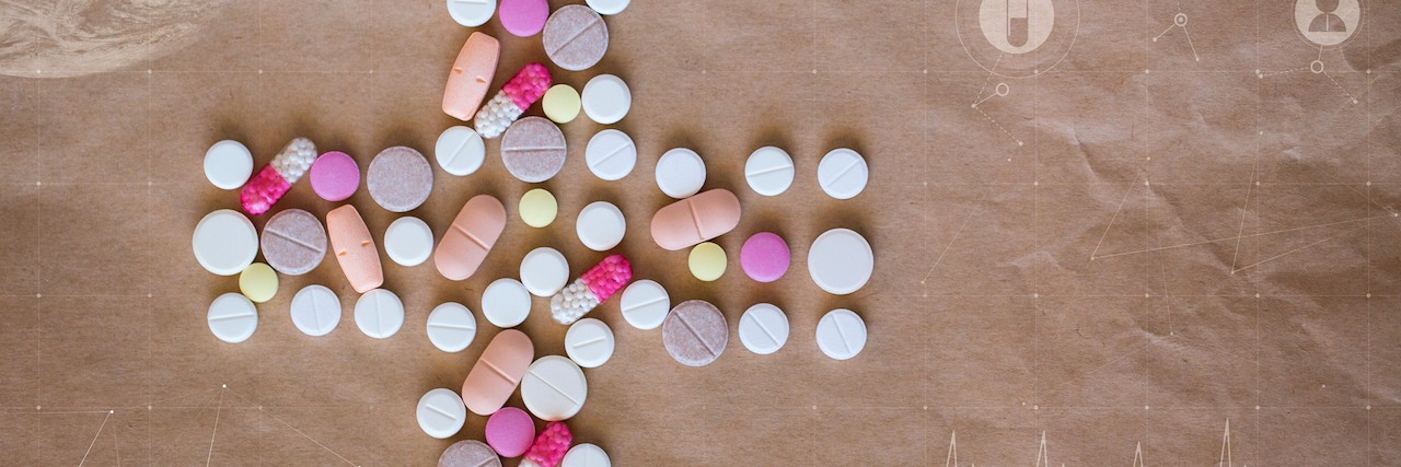 Suicide Prevention and Access to Mental Health Care pills that look like the cross