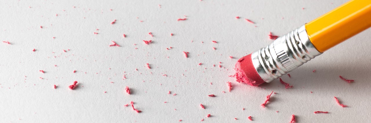 Mental Illness Can't 'Erase' the Good in Life Using a pencil to erase a mistake on a sheet of white paper.