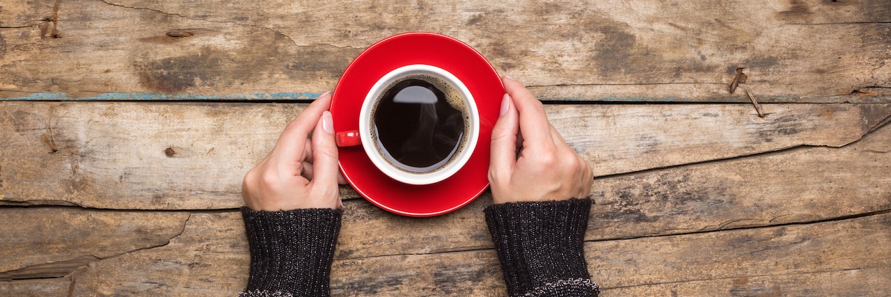 When I Overhead a Group of Women in Starbucks Body-Shaming Someone on Facebook Female hands holding red cup of coffee