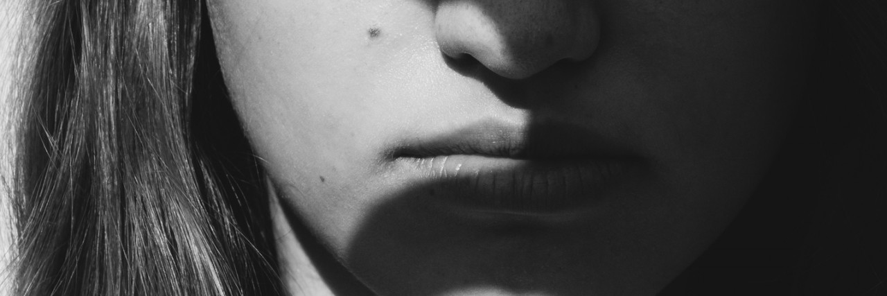 Issues With Seeking Treatment for Mental Illness and Chronic Illness Dramatic artistic portrait of a young woman