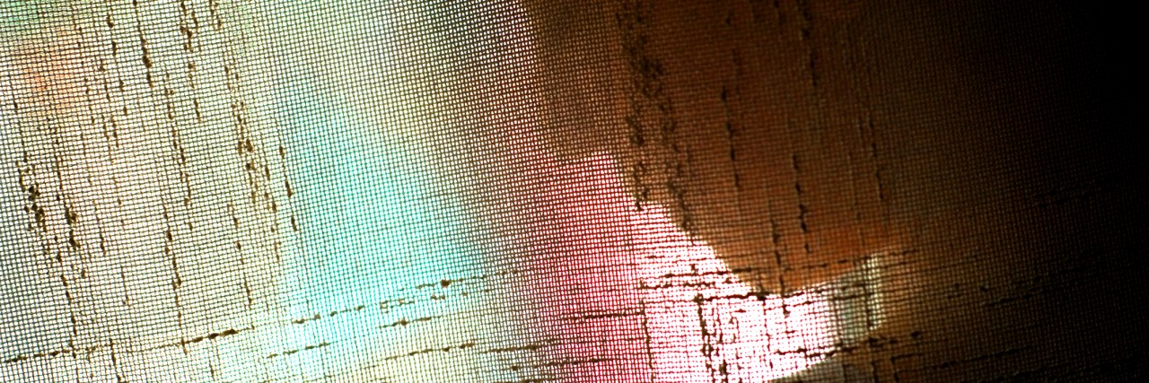 Life as a College Student with Borderline Personality Disorder Silhouette of a woman behind a curtain of colors