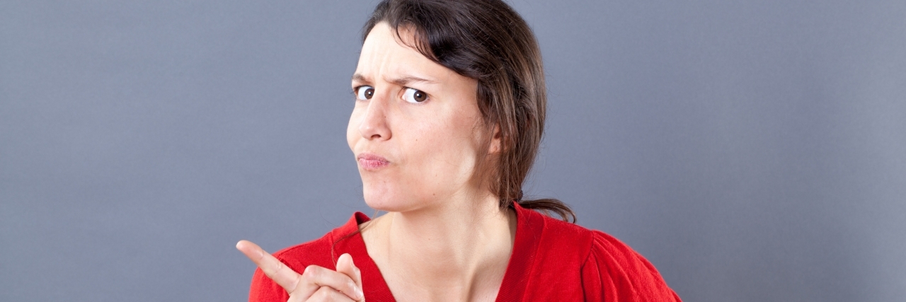 Why Mental Illness Isn't Something to Joke About Irritated woman.