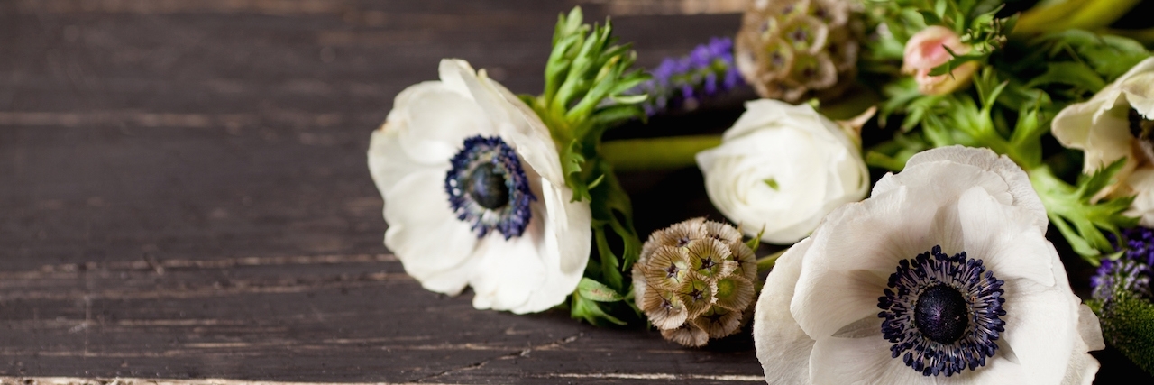 Talking About Mental Illness and Depression After a Suicide Beautifull spring flowers on wood