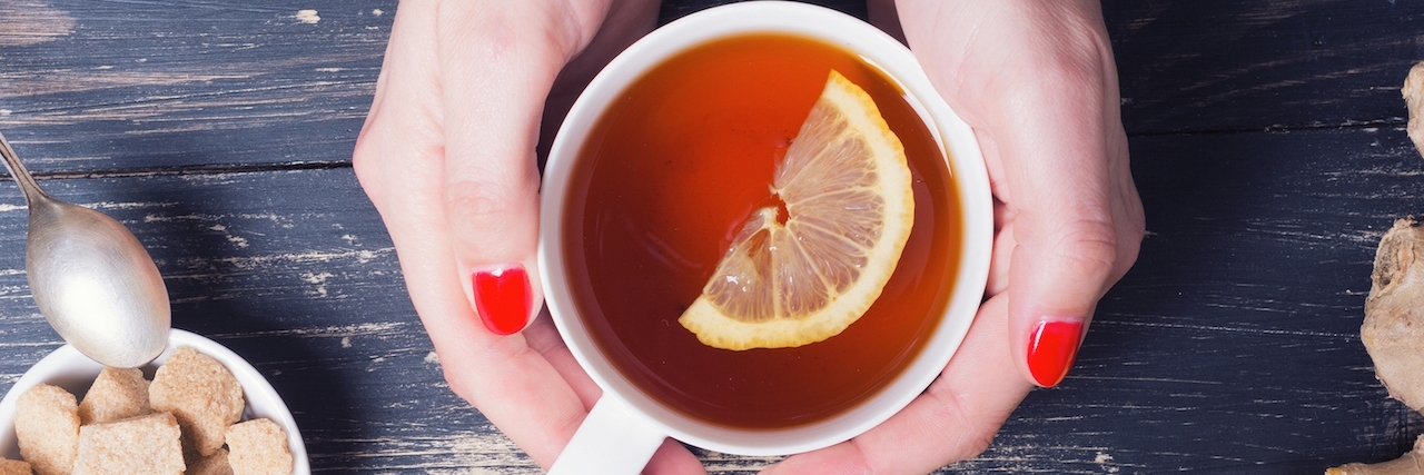 Making a Cup of Tea With Ehlers-Danlos Syndrome Hands of a girl with a cup