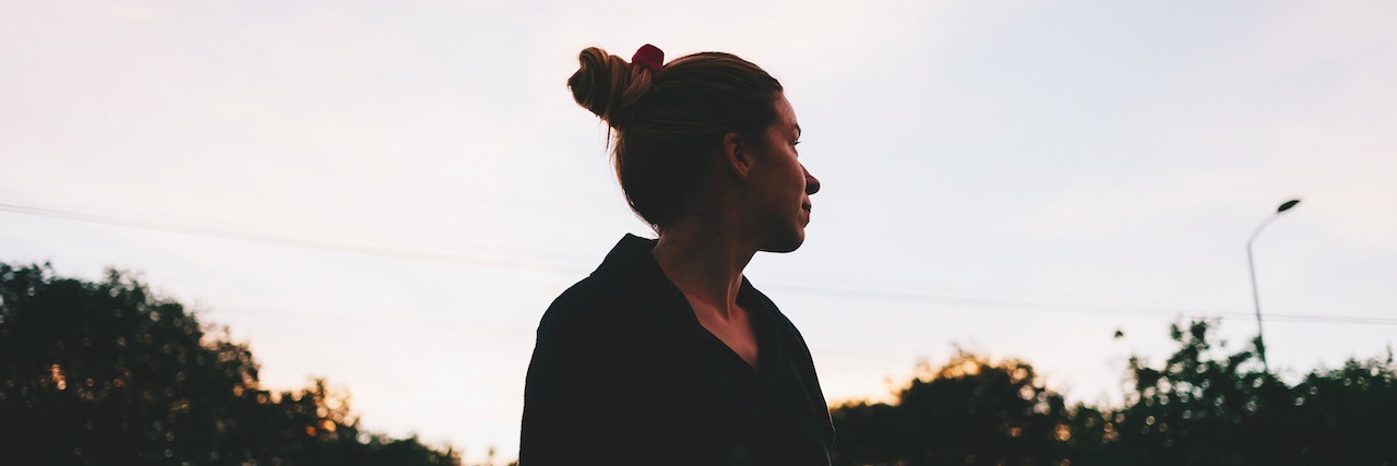 Woman With Lupus Says She Worries About Anything and Everything Woman looking at sunset