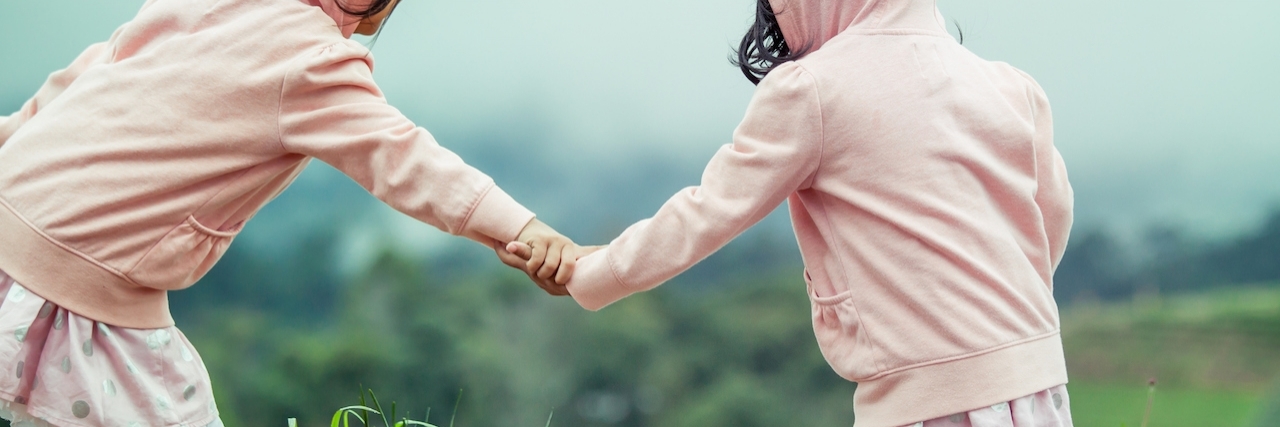 Message to Anyone Who Has Anxiety and Depression Child two cute little girls holding hand each other