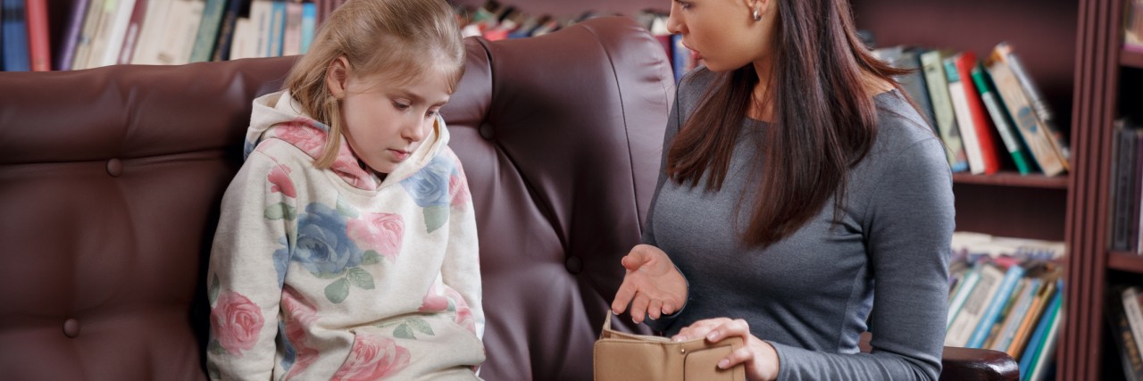 How to Find the Right Therapist for Your Child in the U.K. therapist and little girl