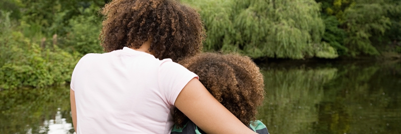 Afraid of Disappointing Kids When I Can't Got to Events Due to Lupus Mother and son looking at lake