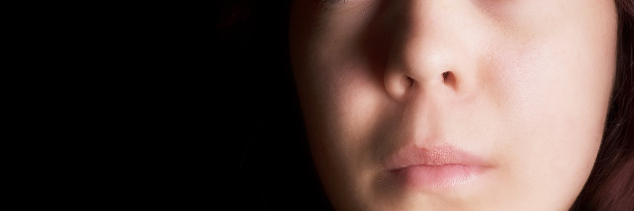 What Not to Say to Someone With an Eating Disorder woman looking to the side
