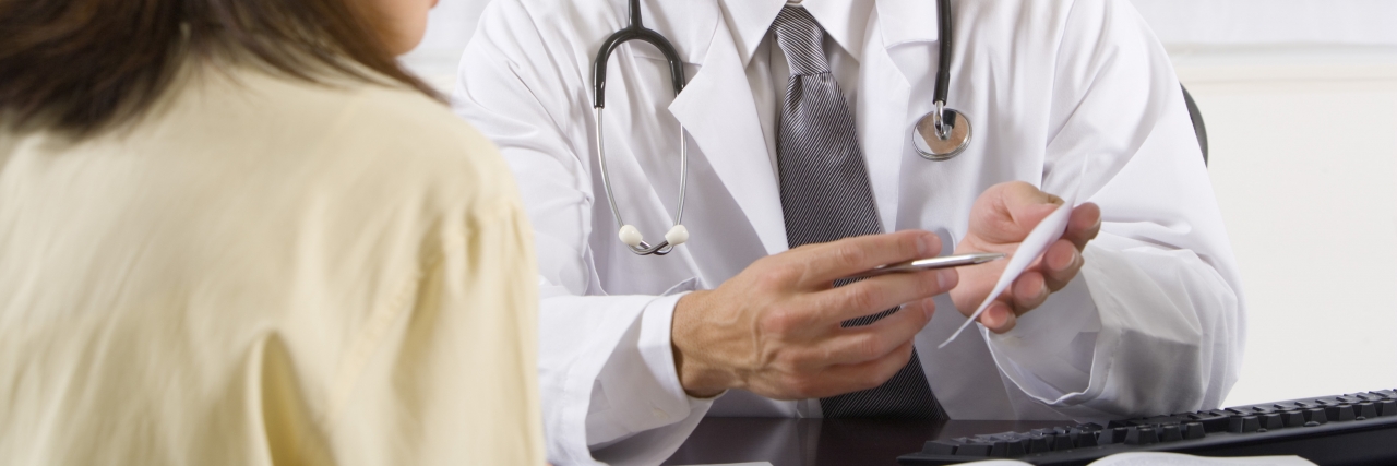 Self-Harm Scars and Dealing With Judgmental Doctors Doctor talking to patient.