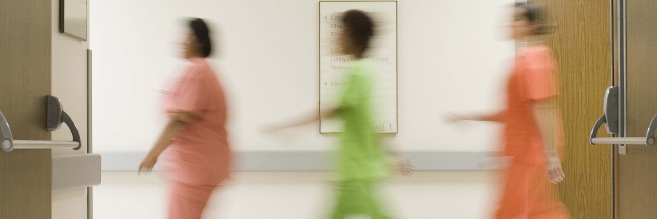 Why Mental Health Providers Shouldn't Say 'Difficult To Engage' Nurses walking in hospital