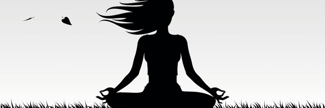 graphic of girl sitting cross legged on ground doing yoga