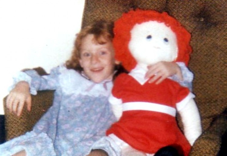 Young Denise and her Annie doll.