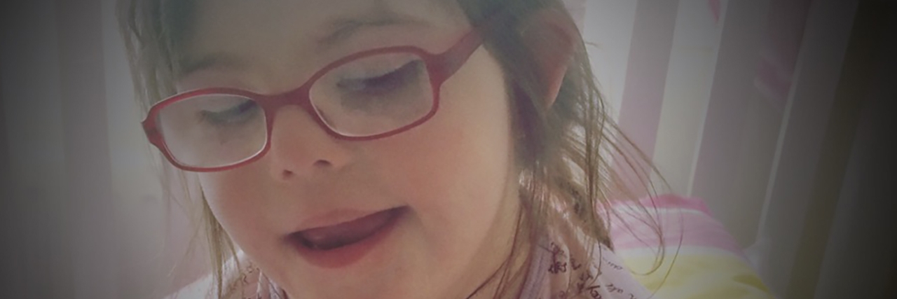 What School Reports Don't Show About My Daughter With Down Syndrome Evie.