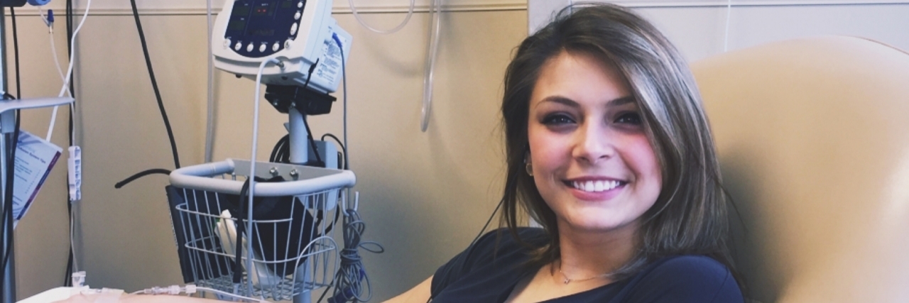 Why I Believe People Who Say I'm Strong for Fighting Crohn's Disease woman sitting in doctor's office getting treatment