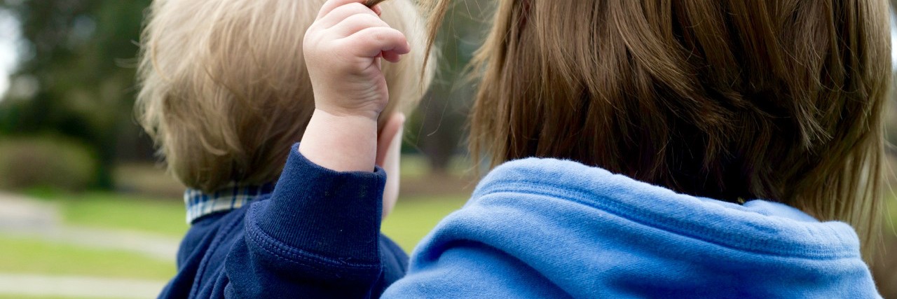 Grandma Responds to Man Who Says Not to Call Her Grandson 'Autistic' noah playing with his grandma's hair