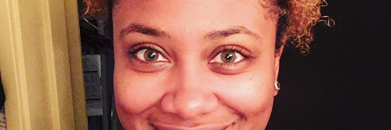 Being a Black Woman With a Mental Illness black woman taking a selfie