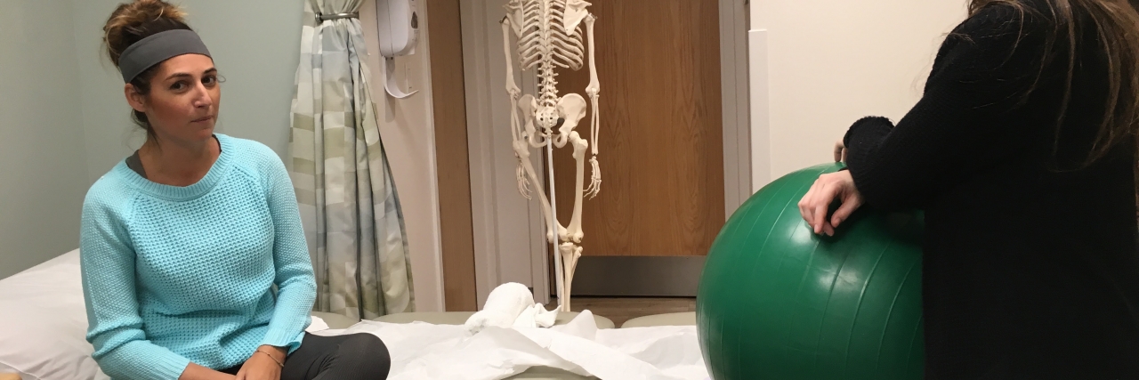 woman in physical therapist office