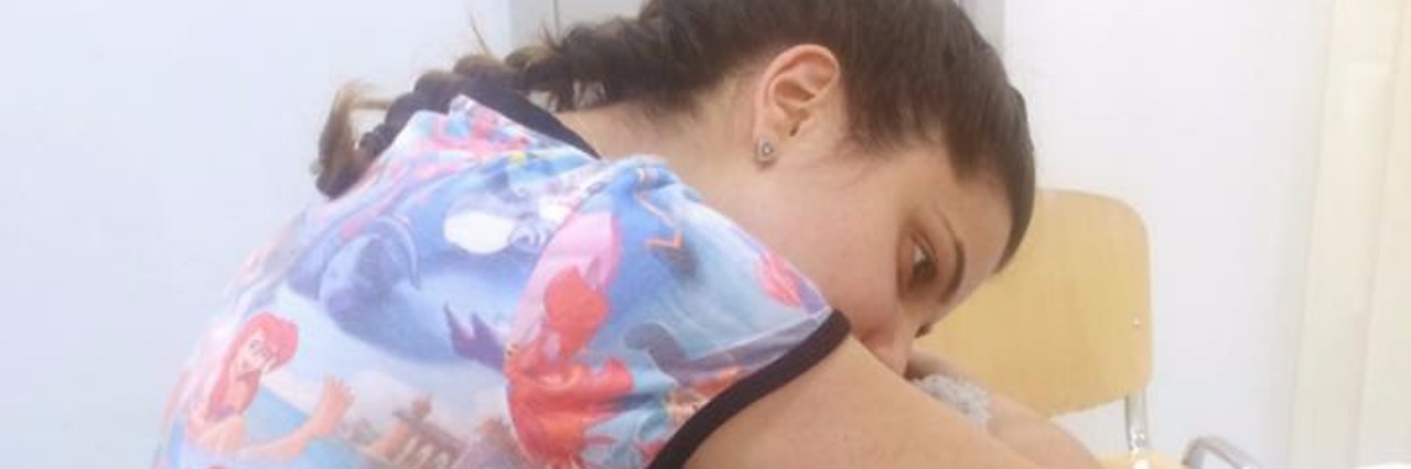 Moving From the Children's Hospital to the Adult Hospital girl sitting on hospital bed