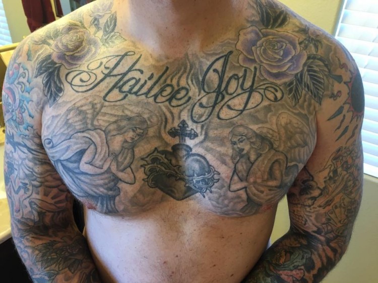 chest tattoo that reads "Hailee Joy"