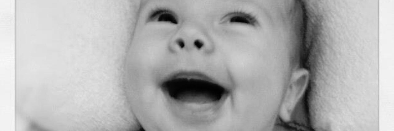 Looking at Photos of My Child After the PICU and Finding Happiness happy baby smiling