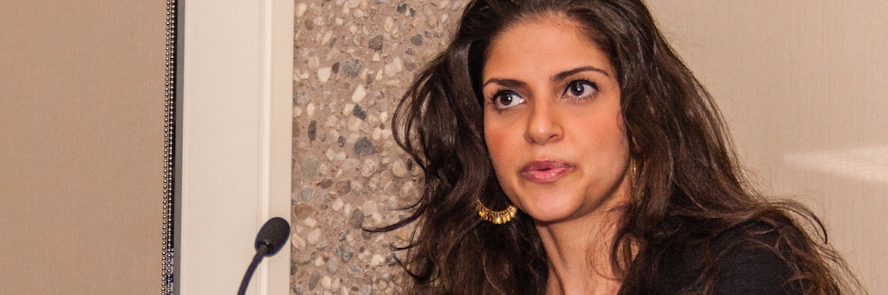 How I'm Thriving With Bipolar Disorder Melody Moezzi giving a speech