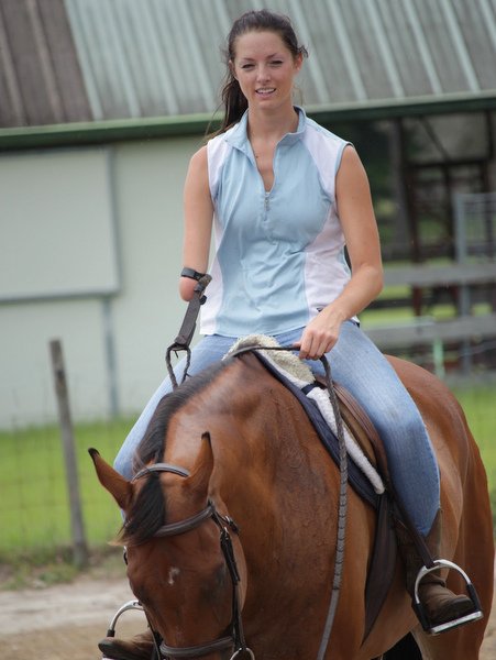 Ashley Sherman riding a horse