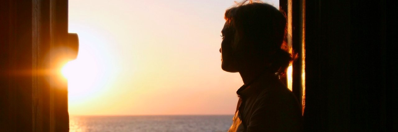 What My Chronic Illness Has Taught Me woman looking out at the sea