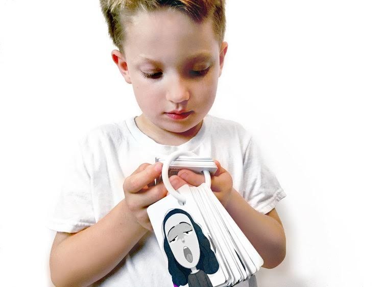 Child looking at Emotion Cards