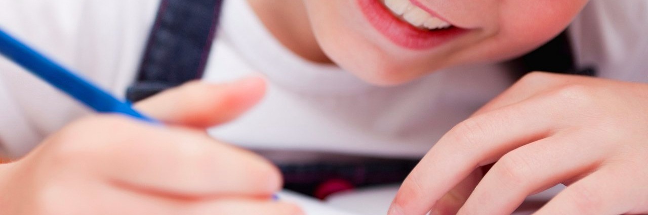 What the New School Year Brings as a Mom of a Child With ADHD girl in class