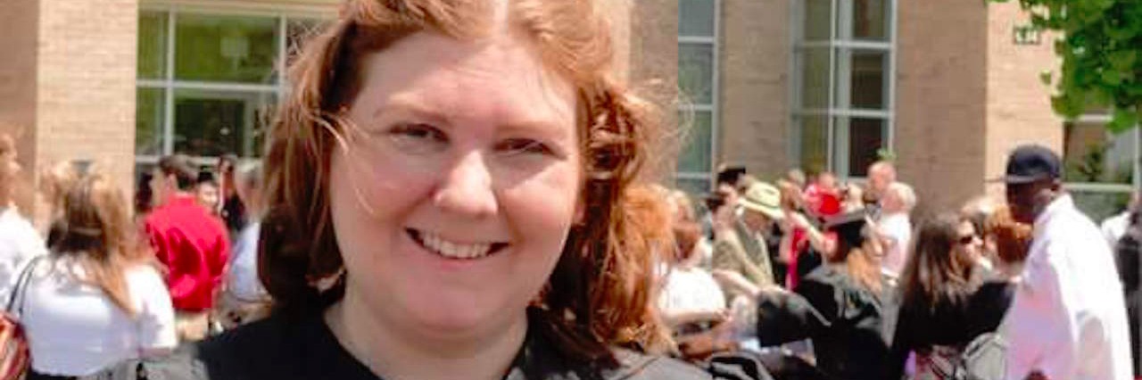 Going to College and Earning a Degree Despite My Learning Disability woman with a learning disability at graduation