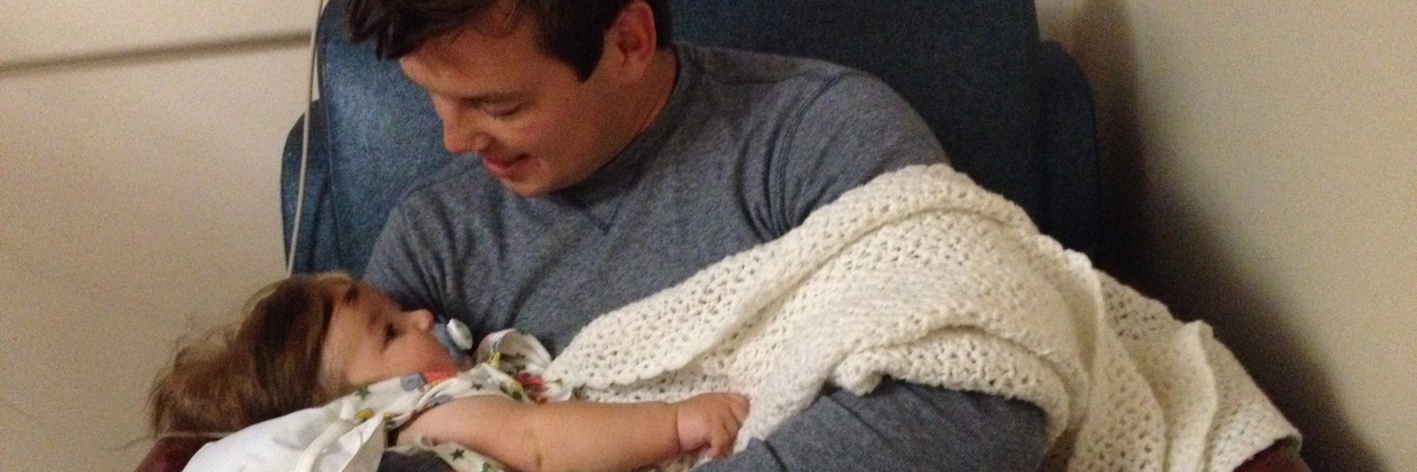 How to Help Support the Family of a Child with FPIES Kristen's husband with their baby